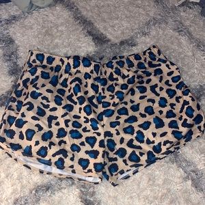 Black and tan and blue shorts size L